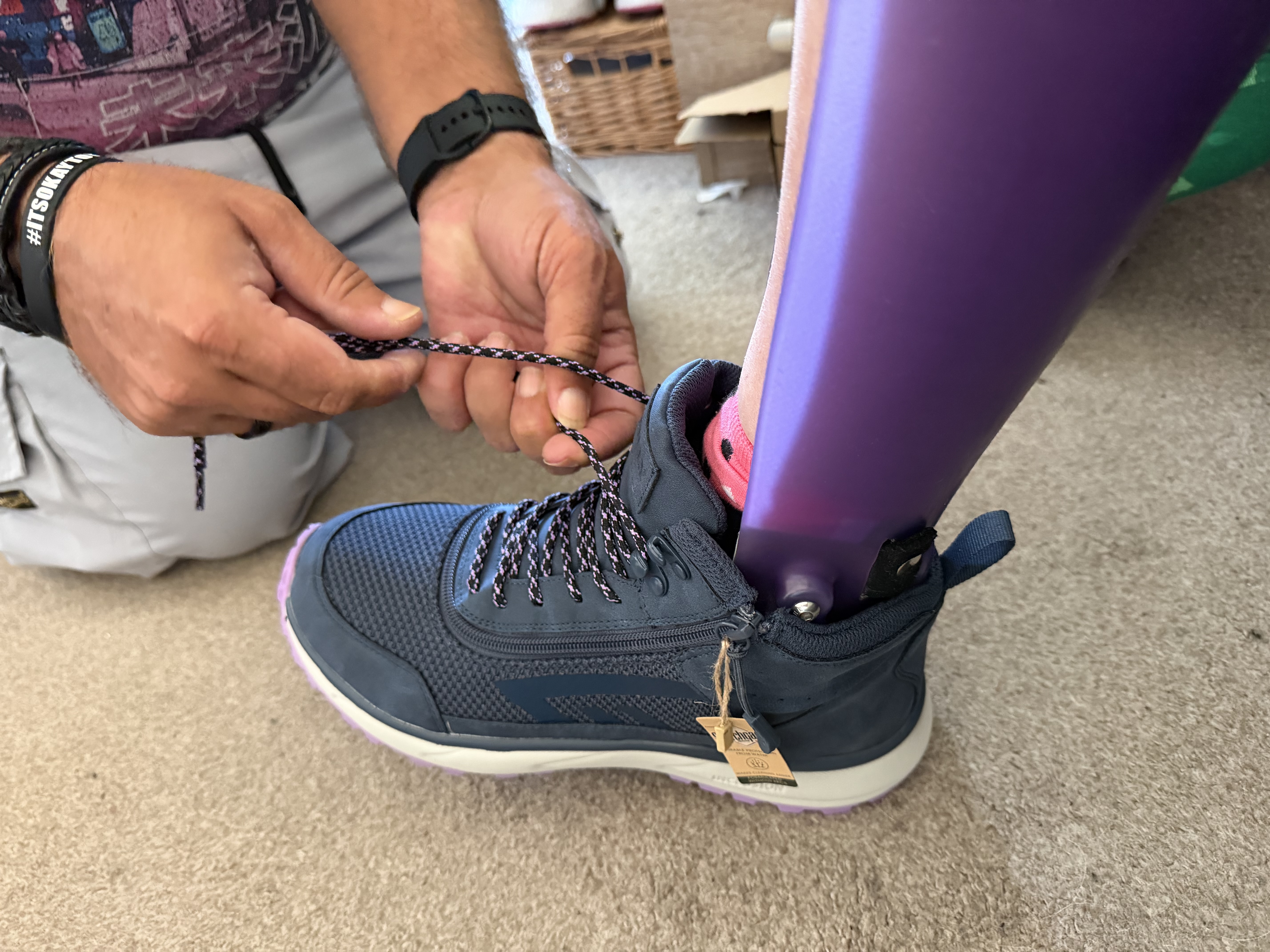 Shoelaces being tied on the Billy Boots shoe.